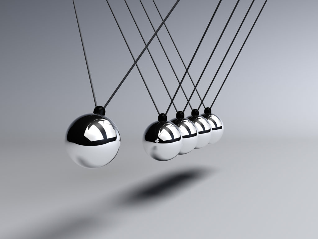 Newtons Cradle close up impact&emotions